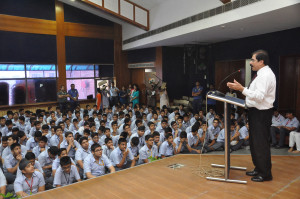 Dr (Brig) YK Arora addresses students at Amity International School Pushp Vihar 